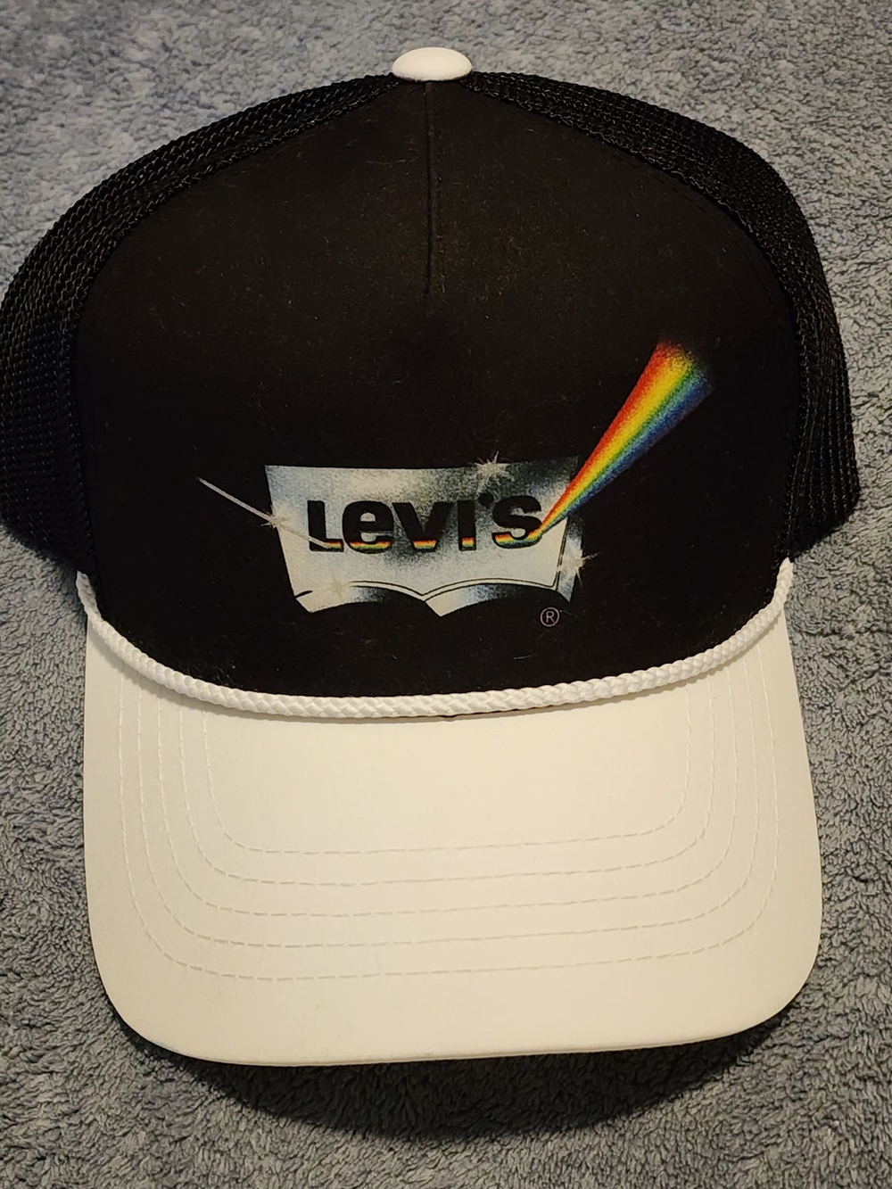 Levi's Pride Hat. Black & White Trucker Hat with Rainbow Logo